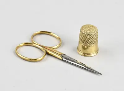 Gouden vingerhoed en schaar – kavel bij Twents Veilinghuis