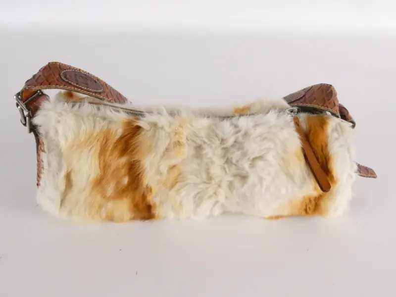 Vintage schoudertas van Tod's – kavel bij De Kringwinkel, Heverlee
