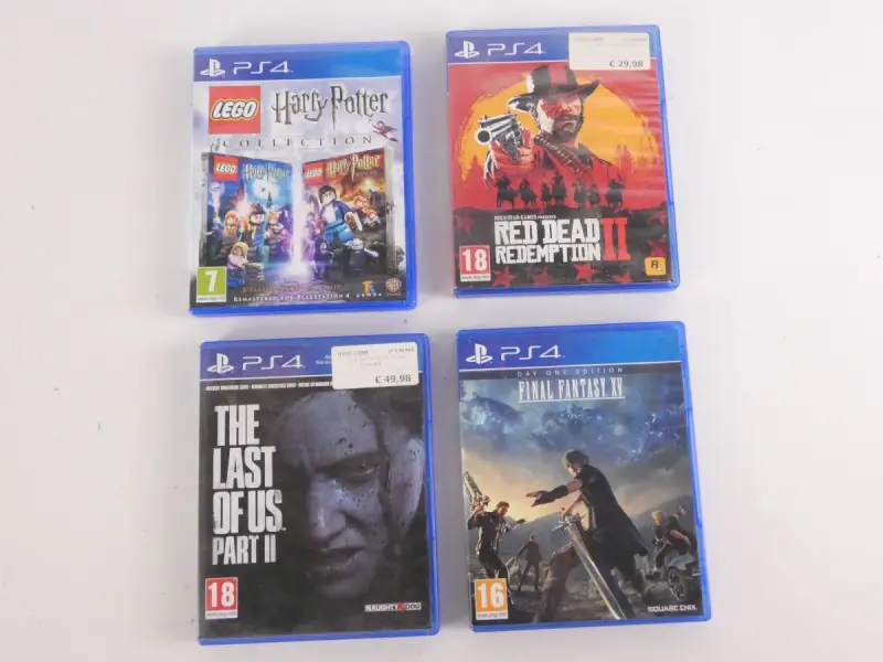 Vier PlayStation games – kavel bij De Kringwinkel, Heverlee