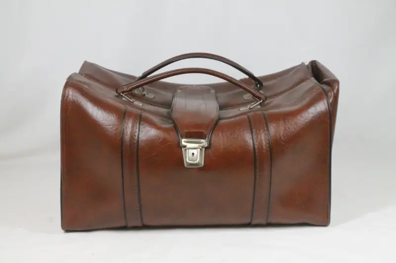 Vintage bruine lederen weekendtas – kavel bij De Kringwinkel, Brecht