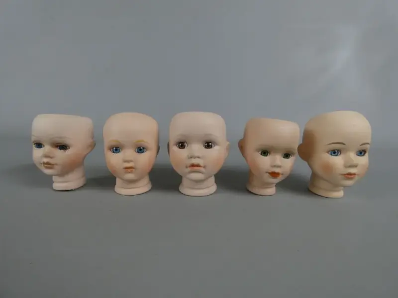 Set van 5 porseleinen poppenhoofden – kavel bij De Kringwinkel, Diest